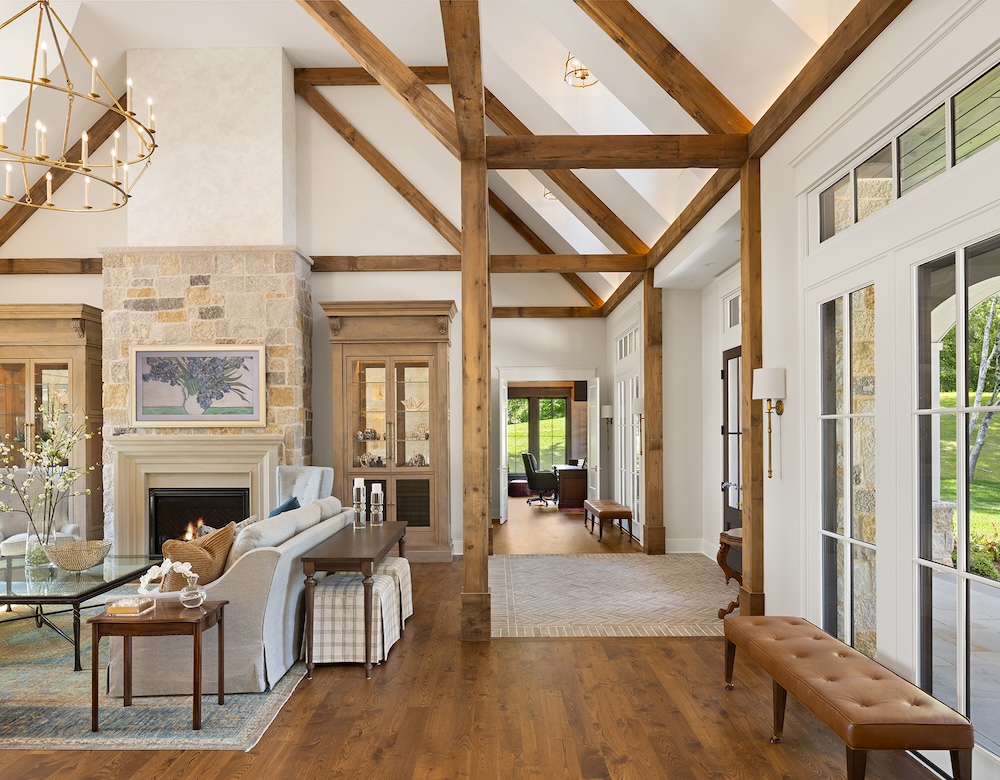Artisan home foyer in Wayzata, Minnesota with exposed beams and elegant details showcasing Wayzata Minnesota interior design