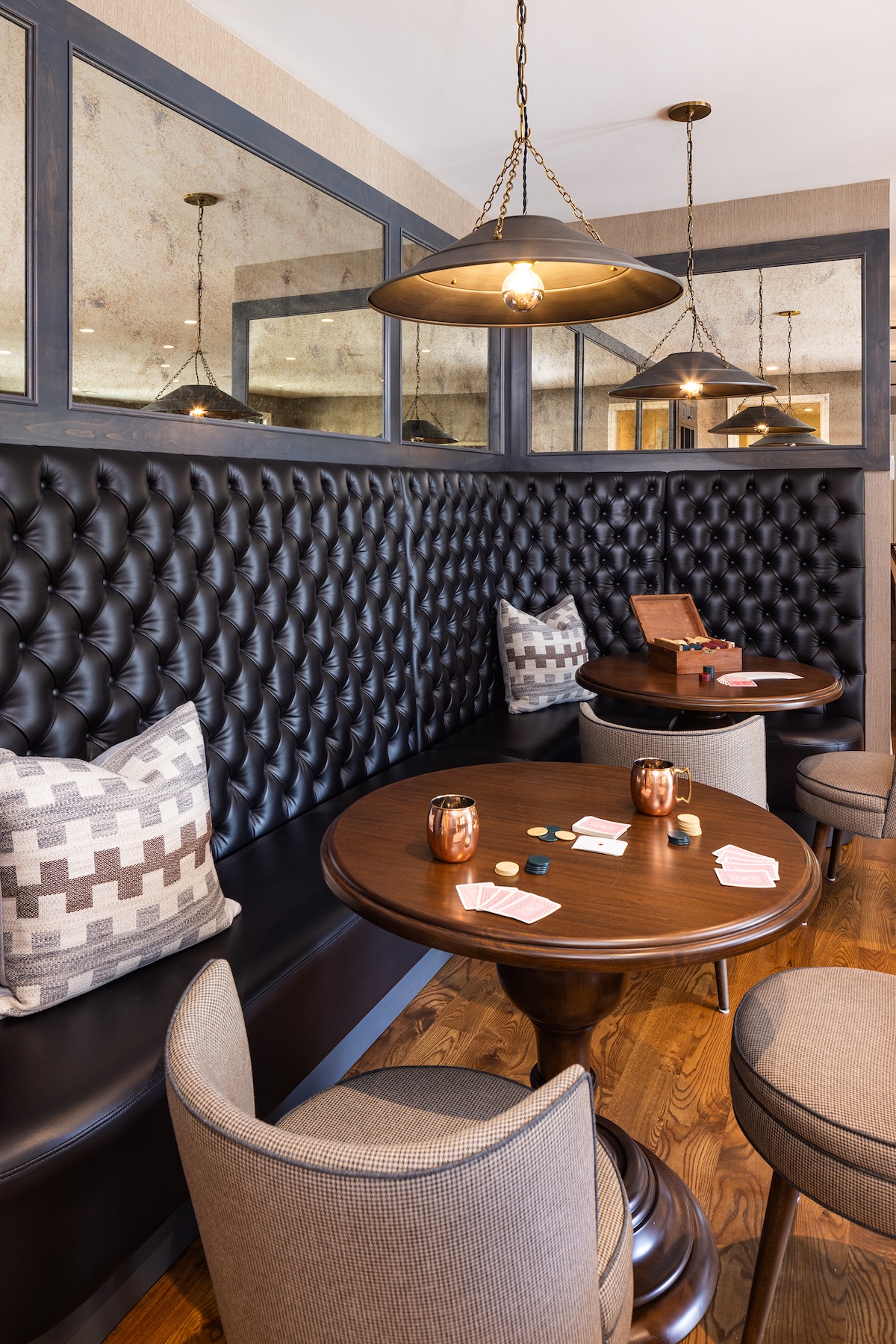 Home pub in Wayzata, Minnesota with custom leather bar stools designed with Wayzata Minnesota interior design principles