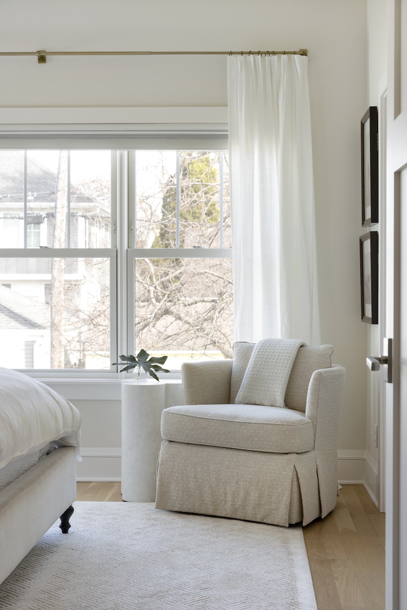 Upholstered side chair in a South Minneapolis home adding texture and functional seating