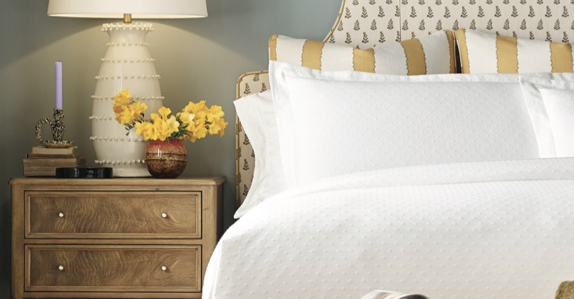 Bedroom furniture sale featuring beds, nightstands, and dressers at Traditions