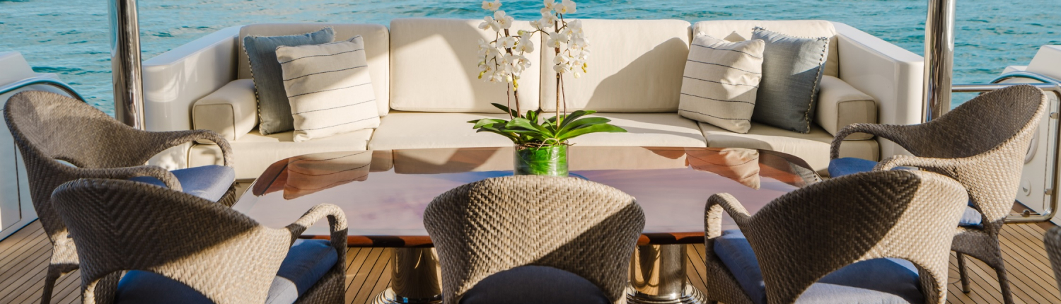 Outdoor yacht deck furniture with blue and white cushions in Naples, Florida by Traditions