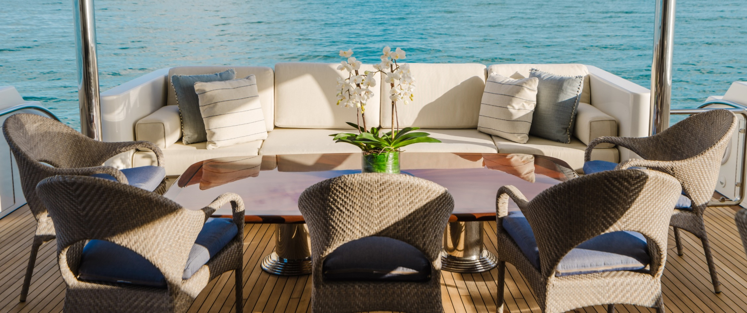 Outdoor yacht deck furniture with blue and white cushions in Naples, Florida by Traditions